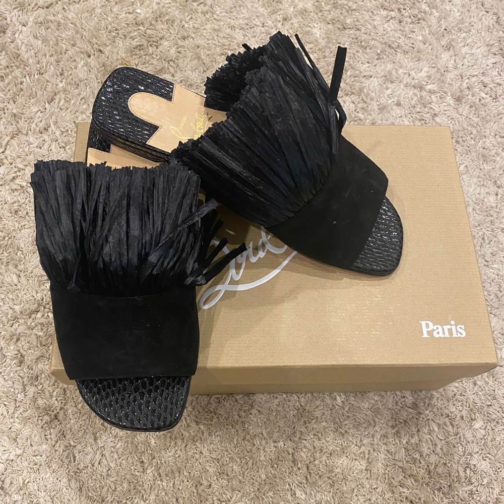 Christian Louboutin flats . NEW